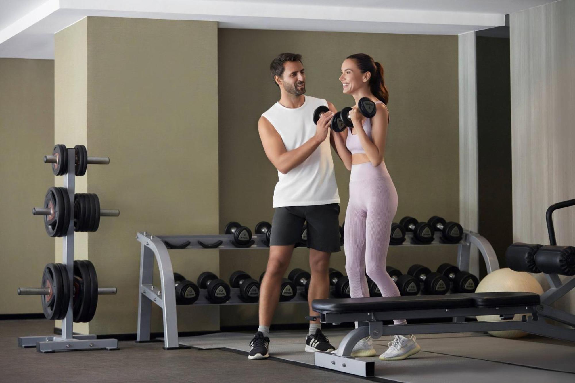 The Stones Hotel - Legian Bali, Autograph Collection Kuta  Exterior photo A personal trainer working with a client